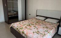 1+1 apartment of 70 m² in Mahmutlar with furniture and a glazed balcony-id-10928-photo-5