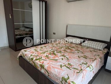 1+1 apartment of 70 m² in Mahmutlar with furniture and a glazed balcony-id-10928-photo-5