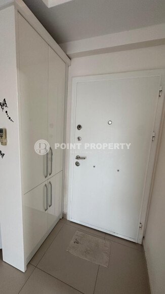 1+1 apartment of 70 m² in Mahmutlar with furniture and a glazed balcony-id-10928-photo-6