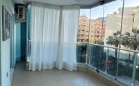 1+1 apartment of 70 m² in Mahmutlar with furniture and a glazed balcony-id-10928-photo-9