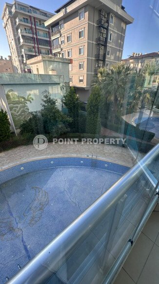 1+1 apartment of 70 m² in Mahmutlar with furniture and a glazed balcony-id-10928-photo-10