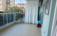 1+1 apartment of 70 m² in Mahmutlar with furniture and a glazed balcony-id-10928-photo-11