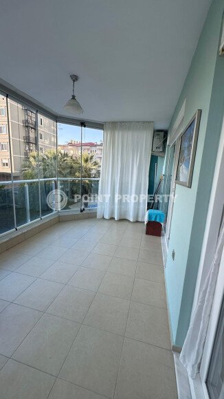 1+1 apartment of 70 m² in Mahmutlar with furniture and a glazed balcony-id-10928-photo-11