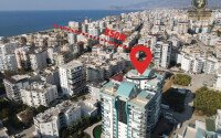1+1 apartment of 70 m² in Mahmutlar with furniture and a glazed balcony-id-10928-photo-12