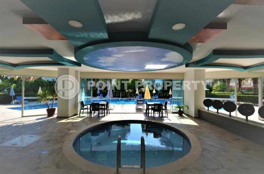 1+1 apartment of 70 m² in Mahmutlar with furniture and a glazed balcony-id-10928-photo-14