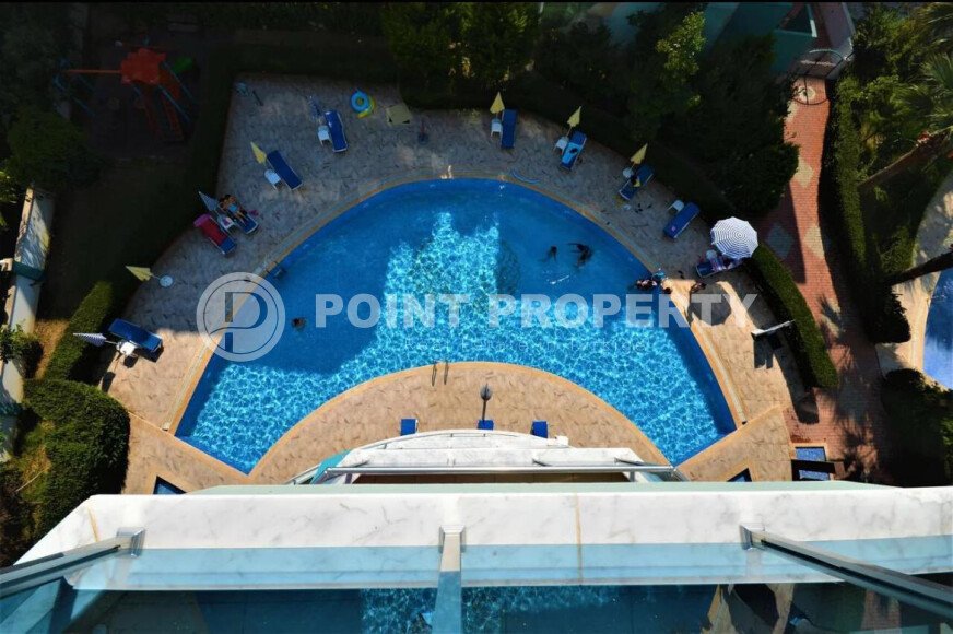 1+1 apartment of 70 m² in Mahmutlar with furniture and a glazed balcony-id-10928-photo-15