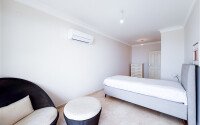 Панорамный дуплекс 4+1 160 м² в стиле виллы с видом на море в районе Бекташ-id-10934-фото-19