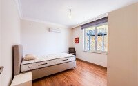 Панорамный дуплекс 4+1 160 м² в стиле виллы с видом на море в районе Бекташ-id-10934-фото-30