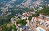Панорамный дуплекс 4+1 160 м² в стиле виллы с видом на море в районе Бекташ-id-10934-фото-35