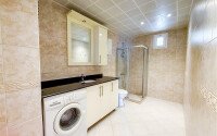 Панорамный дуплекс 4+1 160 м² в стиле виллы с видом на море в районе Бекташ-id-10934-фото-37