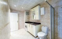 Панорамный дуплекс 4+1 160 м² в стиле виллы с видом на море в районе Бекташ-id-10934-фото-39