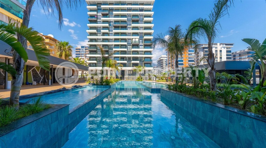 Видовая квартира 1+1 55 м² на первой линии моря в Махмутларе-id-10937-фото-1