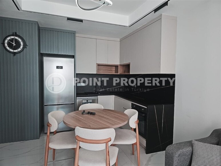 Видовая квартира 1+1 55 м² на первой линии моря в Махмутларе-id-10937-фото-3
