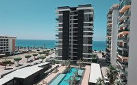 Видовая квартира 1+1 55 м² на первой линии моря в Махмутларе-id-10937-фото-9
