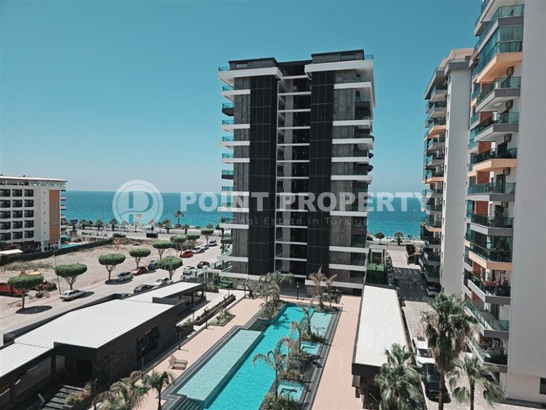 Видовая квартира 1+1 55 м² на первой линии моря в Махмутларе-id-10937-фото-9