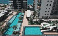Видовая квартира 1+1 55 м² на первой линии моря в Махмутларе-id-10937-фото-11