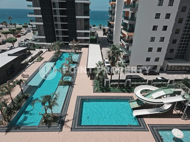 Видовая квартира 1+1 55 м² на первой линии моря в Махмутларе-id-10937-фото-11