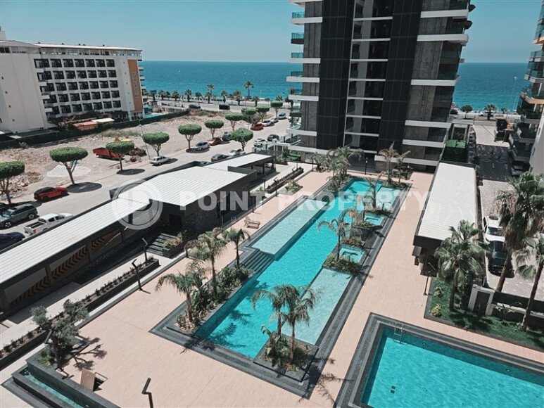 Видовая квартира 1+1 55 м² на первой линии моря в Махмутларе-id-10937-фото-12