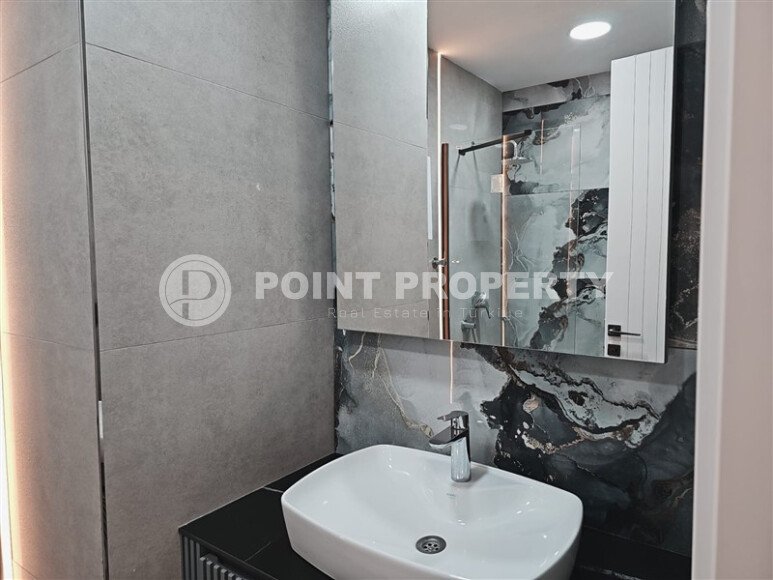 Видовая квартира 1+1 55 м² на первой линии моря в Махмутларе-id-10937-фото-14
