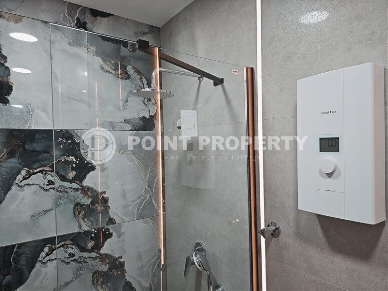 Видовая квартира 1+1 55 м² на первой линии моря в Махмутларе-id-10937-фото-15