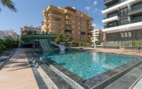Видовая квартира 1+1 55 м² на первой линии моря в Махмутларе-id-10937-фото-16