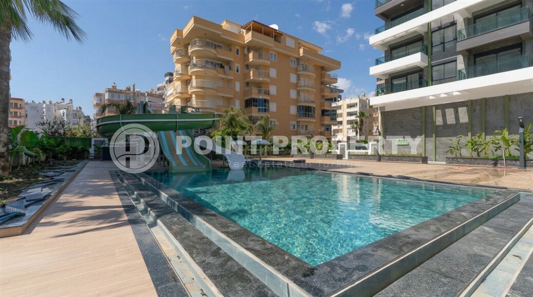 Видовая квартира 1+1 55 м² на первой линии моря в Махмутларе-id-10937-фото-16