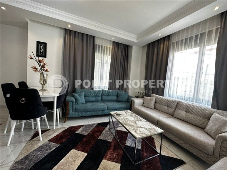 Practical 2+1 apartment 85 m² with garden access in the Hasbahçe area-id-10938-photo-1