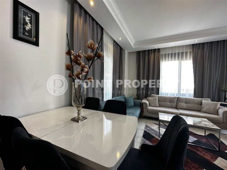 Practical 2+1 apartment 85 m² with garden access in the Hasbahçe area-id-10938-photo-3