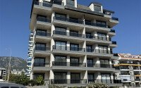 Современная новая квартира 1+1 50 м² в Махмутларе-id-10940-фото-1