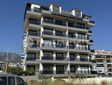 Modern new apartment 1+1 50 m² in Mahmutlar-id-10940-photo-2