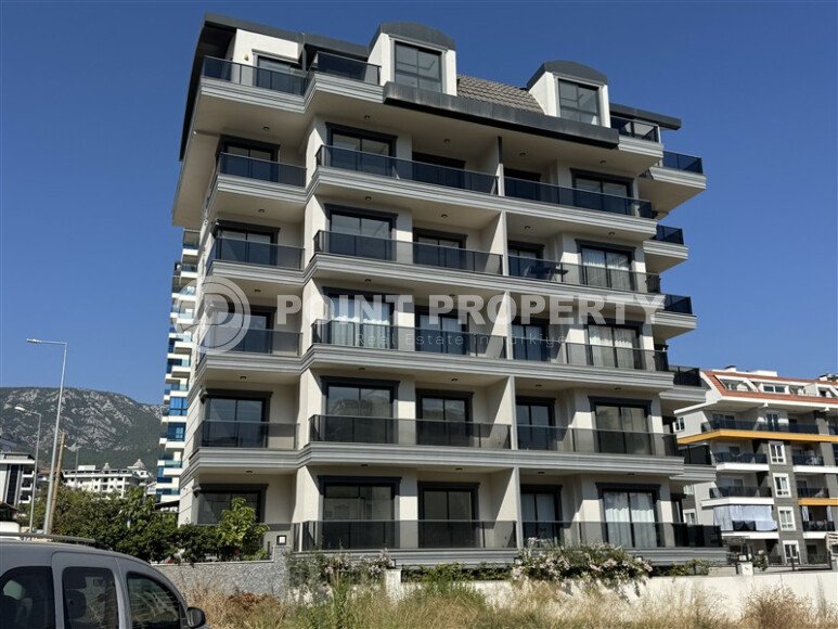 Современная новая квартира 1+1 50 м² в Махмутларе-id-10940-фото-1