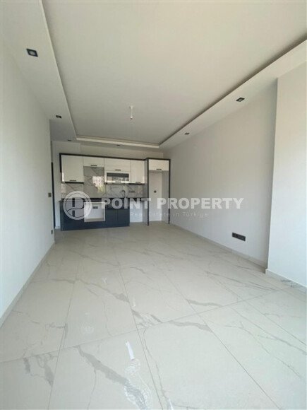 Современная новая квартира 1+1 50 м² в Махмутларе-id-10940-фото-2