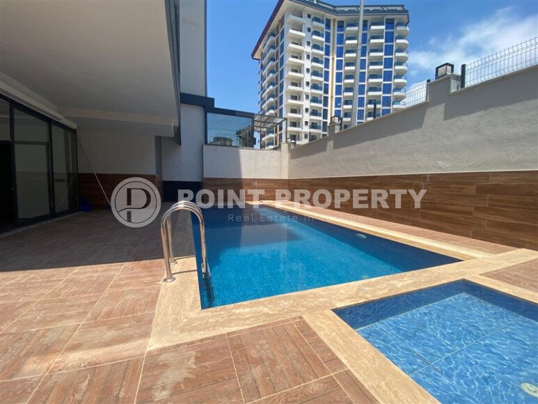 Современная новая квартира 1+1 50 м² в Махмутларе-id-10940-фото-6