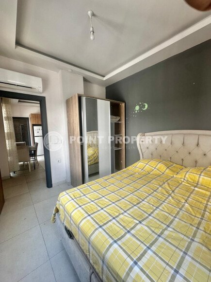 Комфортная квартира 45 м² в районе Махмутлар рядом с музеем Наула-id-10947-фото-4