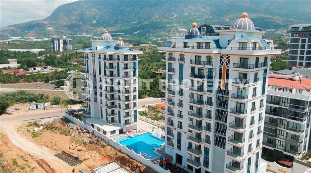 Панорамная квартира 50 м² с видом на горы в районе Махмутлар-id-10955-фото-1