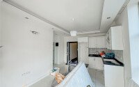 Панорамная квартира 50 м² с видом на горы в районе Махмутлар-id-10955-фото-2