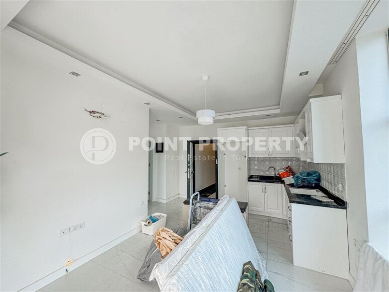 Панорамная квартира 50 м² с видом на горы в районе Махмутлар-id-10955-фото-2
