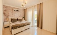 Светлый садовый дуплекс 130 м² с видом на море в районе Кестель-id-10956-фото-10