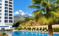 Квартира 1+1, 54 м² в Махмутларе-id-10961-фото-7