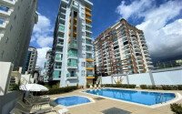 Срочная продажа апартаментов 1+1, 60 м², в 500 метрах от моря, Махмутлар-id-10962-фото-1