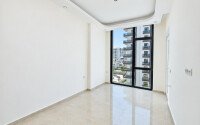 Квартира 58 м² 1+1 в районе Махмутлар-id-10972-фото-4