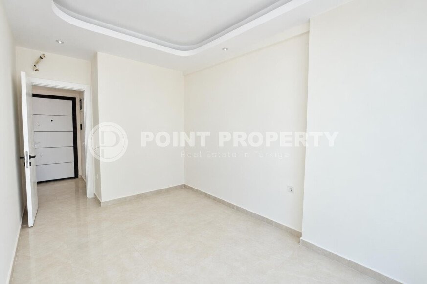 Квартира 58 м² 1+1 в районе Махмутлар-id-10972-фото-6