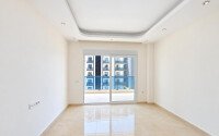 Квартира 58 м² 1+1 в районе Махмутлар-id-10972-фото-5