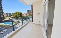 Квартира 58 м² 1+1 в районе Махмутлар-id-10972-фото-10