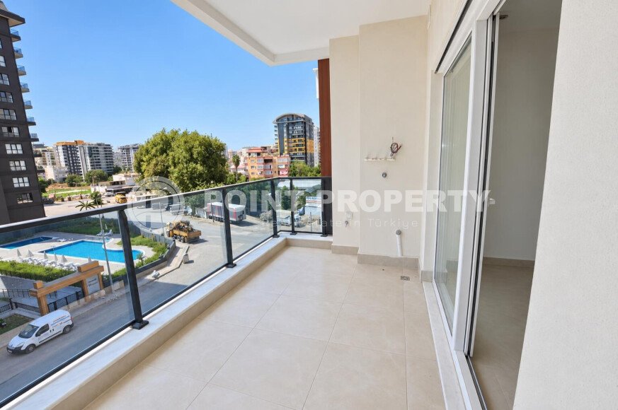 Квартира 58 м² 1+1 в районе Махмутлар-id-10972-фото-10