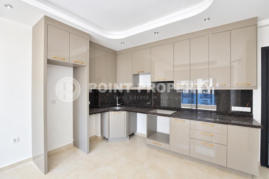 Квартира 58 м² 1+1 в районе Махмутлар-id-10972-фото-3
