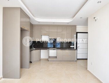 Квартира 58 м² 1+1 в районе Махмутлар-id-10972-фото-2