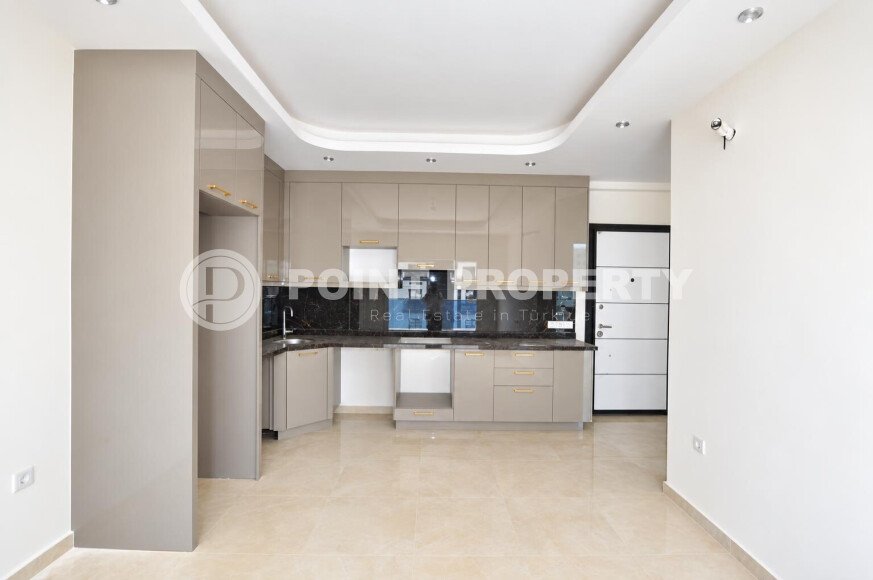 Квартира 58 м² 1+1 в районе Махмутлар-id-10972-фото-2