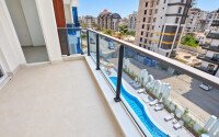 Квартира 58 м² 1+1 в районе Махмутлар-id-10972-фото-11