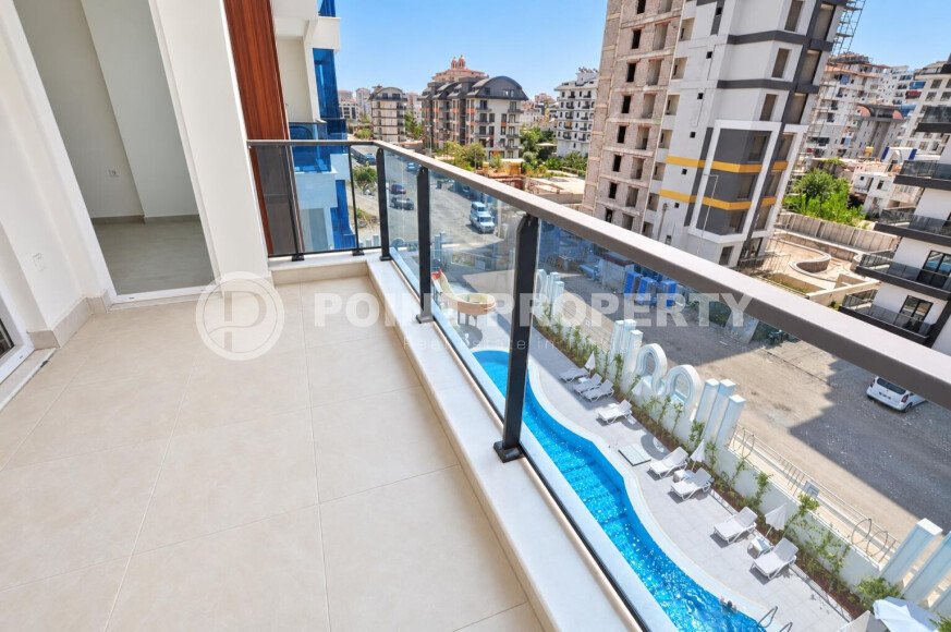 Квартира 58 м² 1+1 в районе Махмутлар-id-10972-фото-11